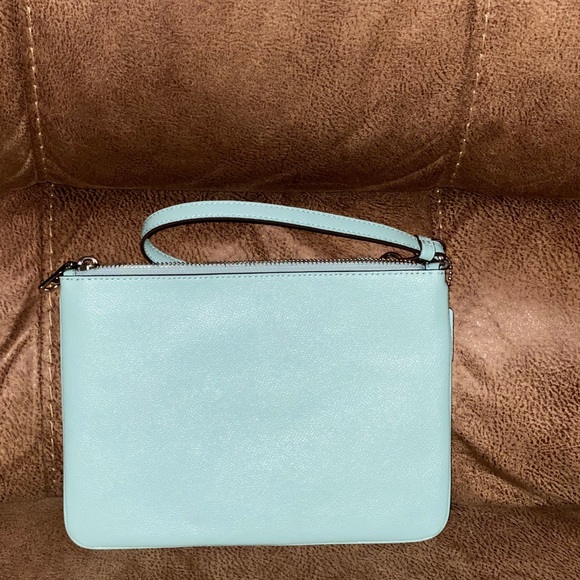 coach gallery pouch with umbrella motif